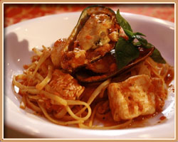 Fillet Of Salmon with Anchovies and Tomatoes